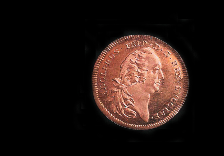 Mynt mot svart bakgrund