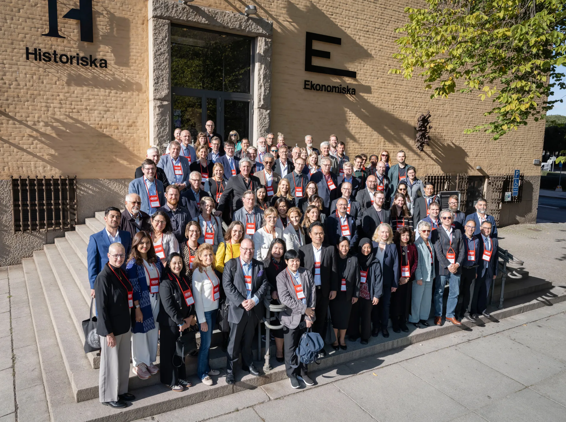 Image of the participants of the 2024 ICOMON conference  in front of the enterence of the Economy museum. 